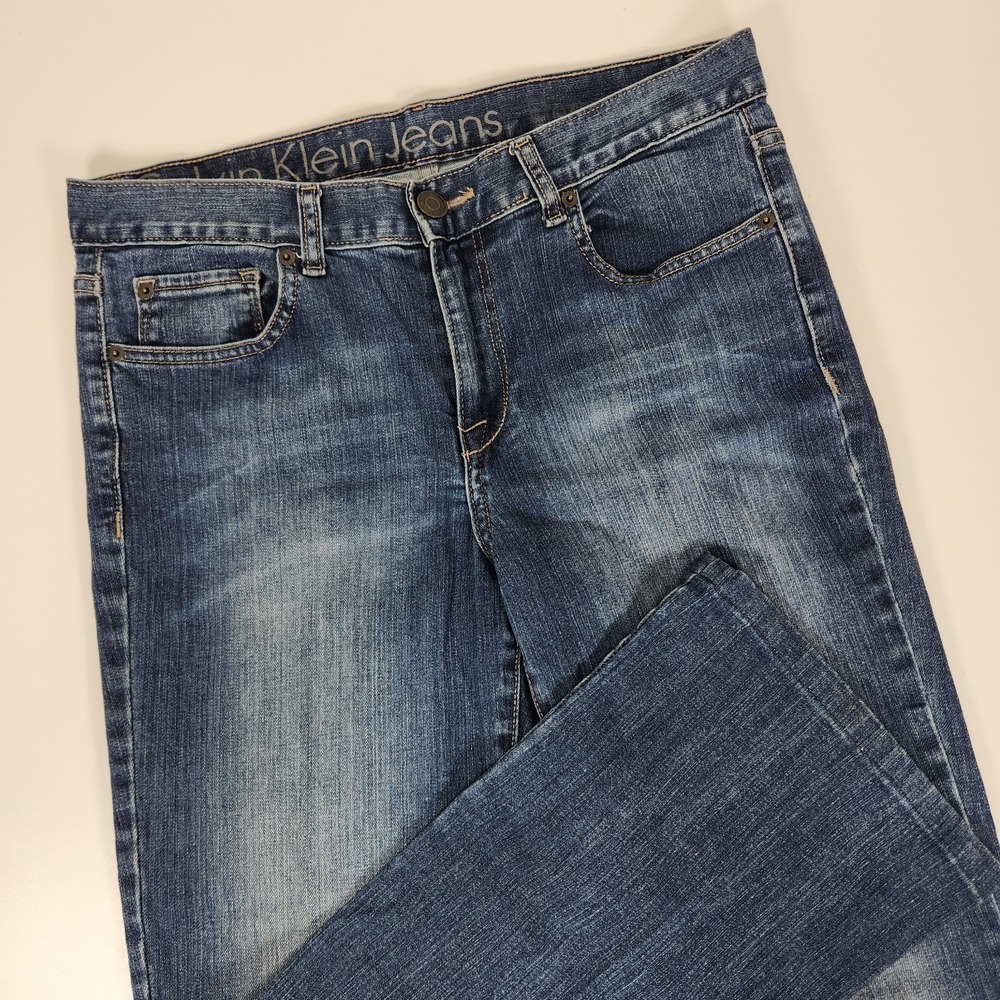 Womens Calvin Klein Jeans Mid Rise Boot Cut Size 30/10 Medium Wash Hemmed to 28"